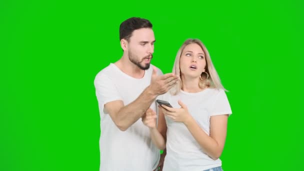 Young Couple Trying Find Direction Using Mobile Application Green Screen — Stock Video