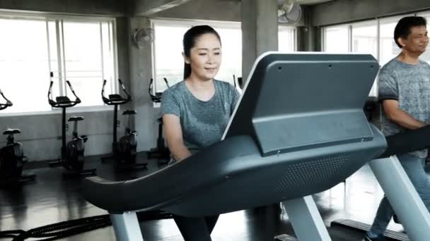 Senior Couple Running Treadmill Together Authentic Senior Life Style Concept — Stock Video