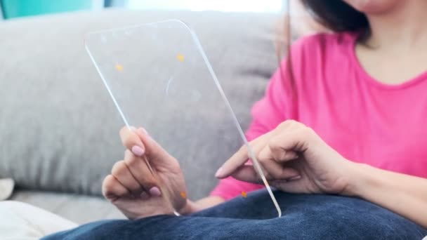 Young Beautiful Asian Woman Browsing Transparent Display Sitting Couch Her — 비디오