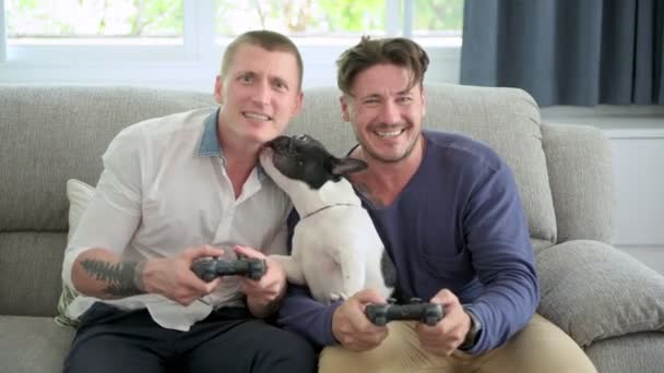 Caucasian Gay Couple Playing Video Game Joystics Home — Stock Video