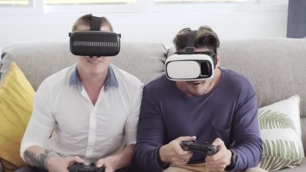 Caucasian Gay Couple Playing Video Game Joystics Home Wearing Virtual — Stock Video