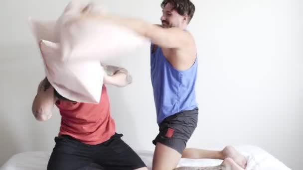 Caucasian Gay Couple Fighting Pillows Home — Stock Video