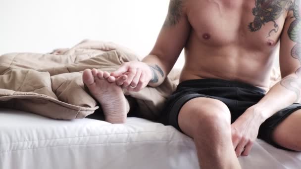 Caucasian Gay Man Sitting Edge Bed While His Boyfriend Sleeping — Stock Video