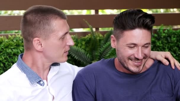 Caucasian Gay Couple Sitting Garden Talking — Stock Video
