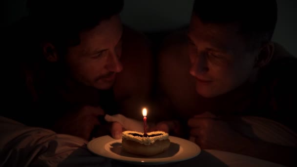 Caucasian Gay Couple Lying Bed Cake Heart Form Plate — Stock Video