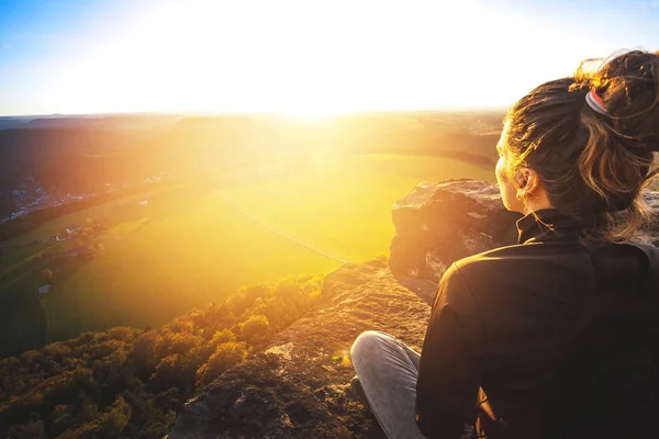 Meditation in soft light in the german Saxon Switzerland National Park close to Dresden. Hiking and climbing in wonderful mountain ranges of the Elbe Sandstone Mountains.