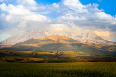 Landscape in Iran. Road trip to Tabriz in Iranian Azerbaijan.Beautiful and historical capitals of Iran and the present capital of East Azerbaijan province. Located in the Quru River valley, Sahand and Eynali mountains, close to Lake Urmia. clipart
