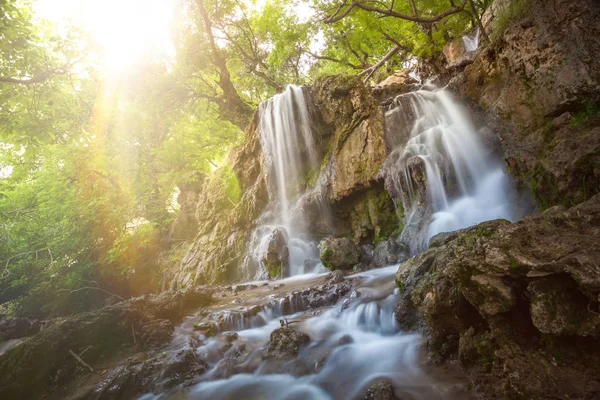 Lense effects with waterfall around Khorramabad County, western Iran. One stop during a roadtrip in Iran. Hiking tours in the mountains and waterfalls. Bisheh, Lorestan Province.