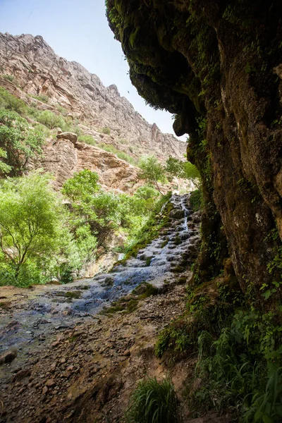 Waterfall in the Mountains. Landscape and nature around Khorramabad County, western Iran. One stop during a roadtrip in Iran. Hiking tours in the mountains and waterfalls. Bisheh, Lorestan Province.