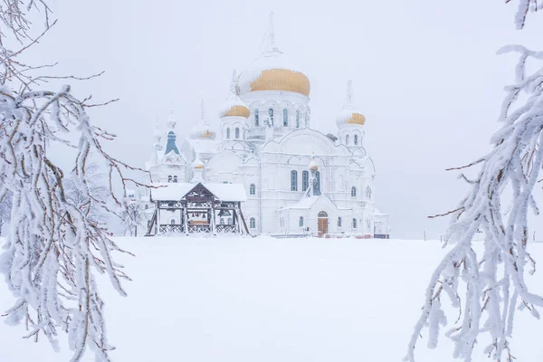 Russian church covered with snow at frosty winter day