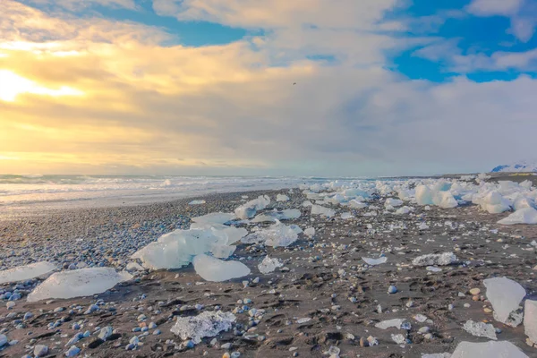 Ice cube breaking on black rock beach , Iceland winter season la — Stock Photo, Image
