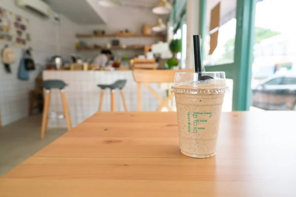 Coffee frappe on wooden table — Stock Photo, Image