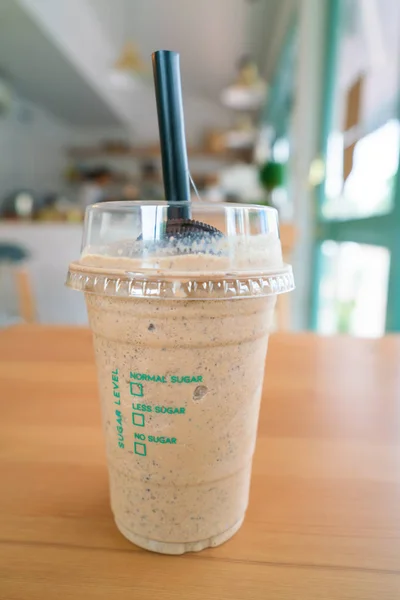 Coffee frappe on wooden table