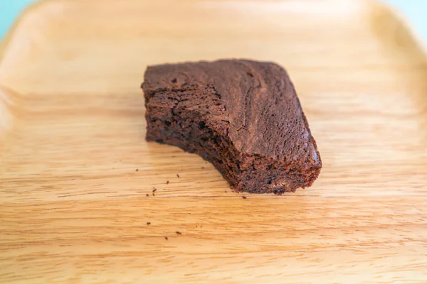 Chocolate brownies on wooden surface — Stock Photo, Image