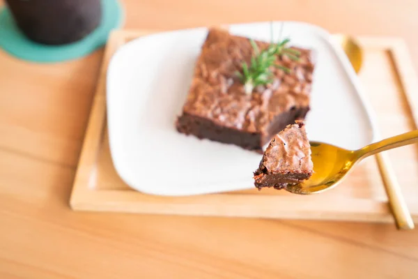 Chocolate brownies on wooden surface — Stock Photo, Image