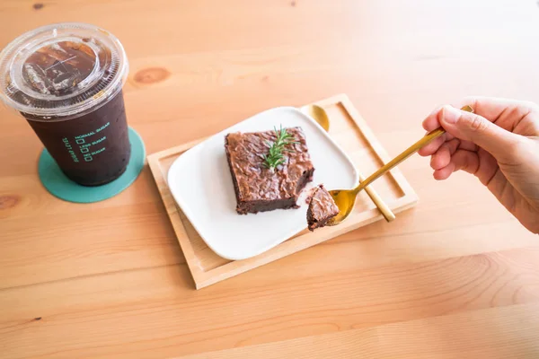 Chocolate brownies on wooden surface — Stock Photo, Image