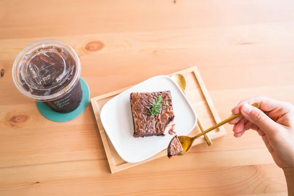 Chocolate brownies on wooden surface — Stock Photo, Image