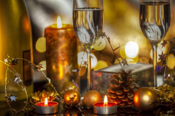 Christmas Decoration Champagne Glasses Baubles Candles Blurred Lights Background — Stock Photo, Image