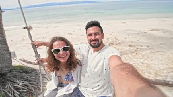A Young Couple Swinging On A Swing And Shoot Themselves On Camera In A Tropical Beach Couple In Love On A Beach Swing By The Sea In Southeast Asia Selfie