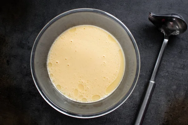 Pancakes Crepe Raw Dough Dark Background Top View — Stock Photo, Image