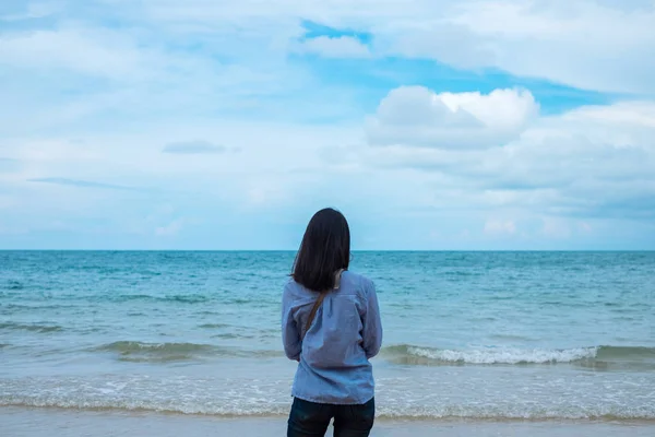 Pretty Young Girl Standing In Sea. Back Side To Camera Stock Photo, Picture  and Royalty Free Image. Image 5712697.