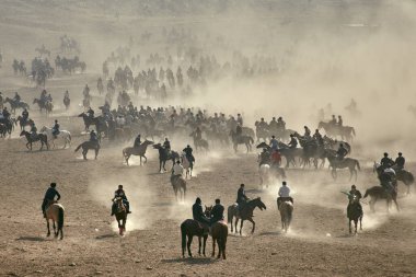 Uzbekistan, Parkent-01.25.2018: Ulak-Kupkari (buzkashi)-traditional horse riding competition in Uzbekistan, Kazakhstan and Kirgizstan