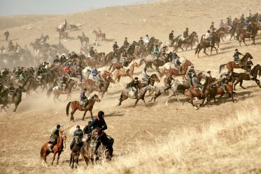 Uzbekistan, Parkent-01.25.2018: Ulak-Kupkari (buzkashi)-traditional horse riding competition in Uzbekistan, Kazakhstan and Kirgizstan
