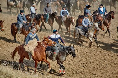Uzbekistan, Parkent-01.25.2018: Ulak-Kupkari (buzkashi)-traditional horse riding competition in Uzbekistan, Kazakhstan and Kirgizstan