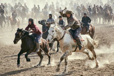 Uzbekistan, Parkent-01.25.2018: Ulak-Kupkari (buzkashi)-traditional horse riding competition in Uzbekistan, Kazakhstan and Kirgizstan