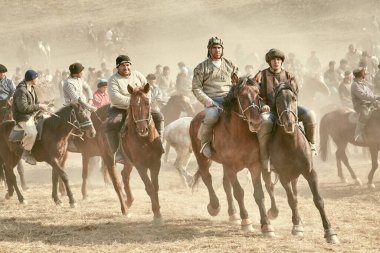 Uzbekistan, Parkent-01.25.2018: Ulak-Kupkari (buzkashi)-traditional horse riding competition in Uzbekistan, Kazakhstan and Kirgizstan