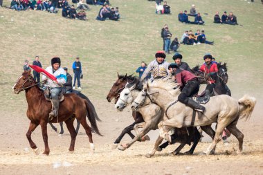 Uzbekistan, Parkent-03.08.2019: Ulak-Kupkari (buzkashi)-traditional horse riding competition in Uzbekistan, Kazakhstan and Kirgizstan