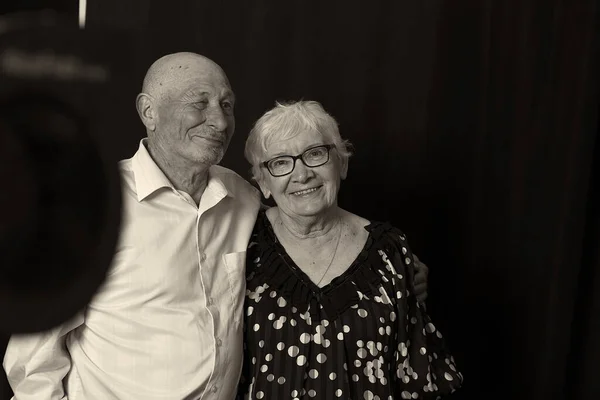 Portrait of senior elderly couple demonstrate their true love to each other, have good relationships, experienced many positive and negative events in life together, being inseparable and supportive.