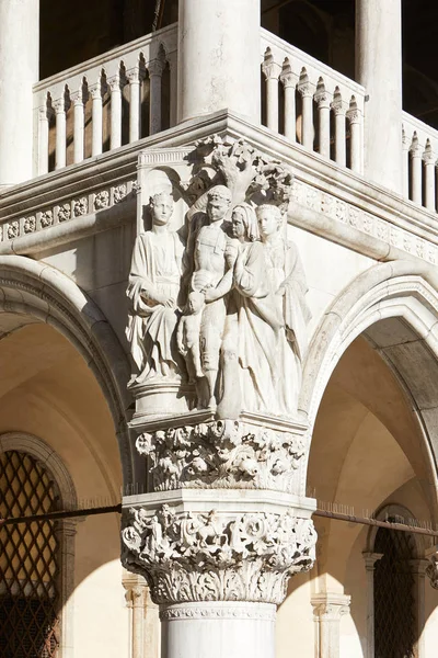 Venice, Doge palace white sculptures and capital in a sunny day in Italy