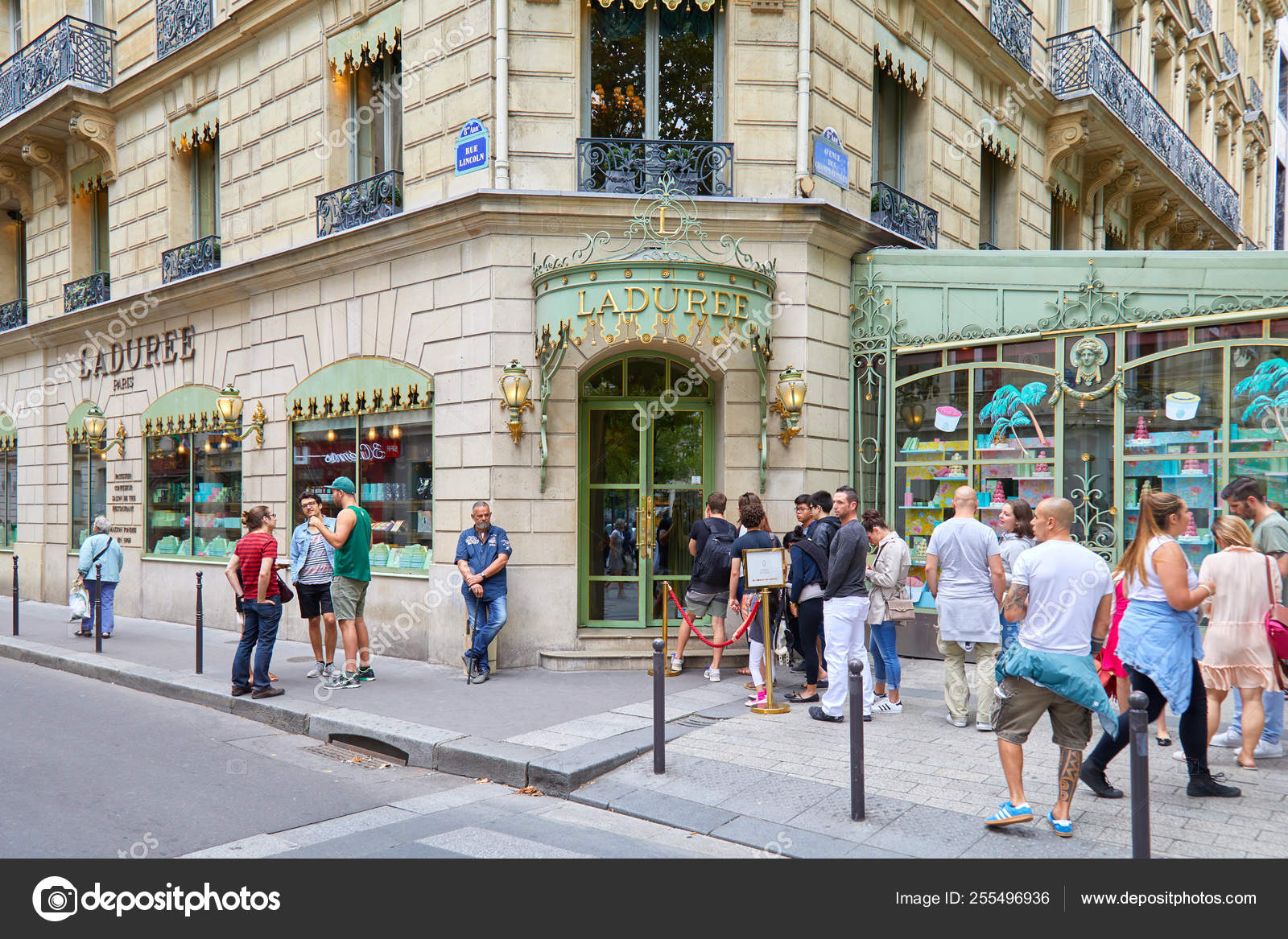 Goyard Luxury Store in Paris with Window and and People Waiting in