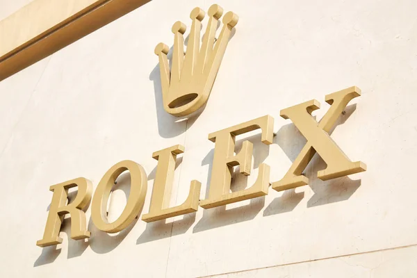 Rolex luxury watch store golden sign in sunlight in Monte Carlo, Monaco — Stock Photo, Image