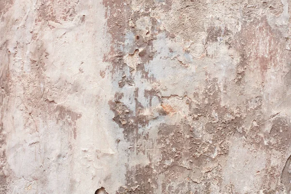 Oude beige afgestoken muur met vochtigheid vlekken textuur achtergrond — Stockfoto
