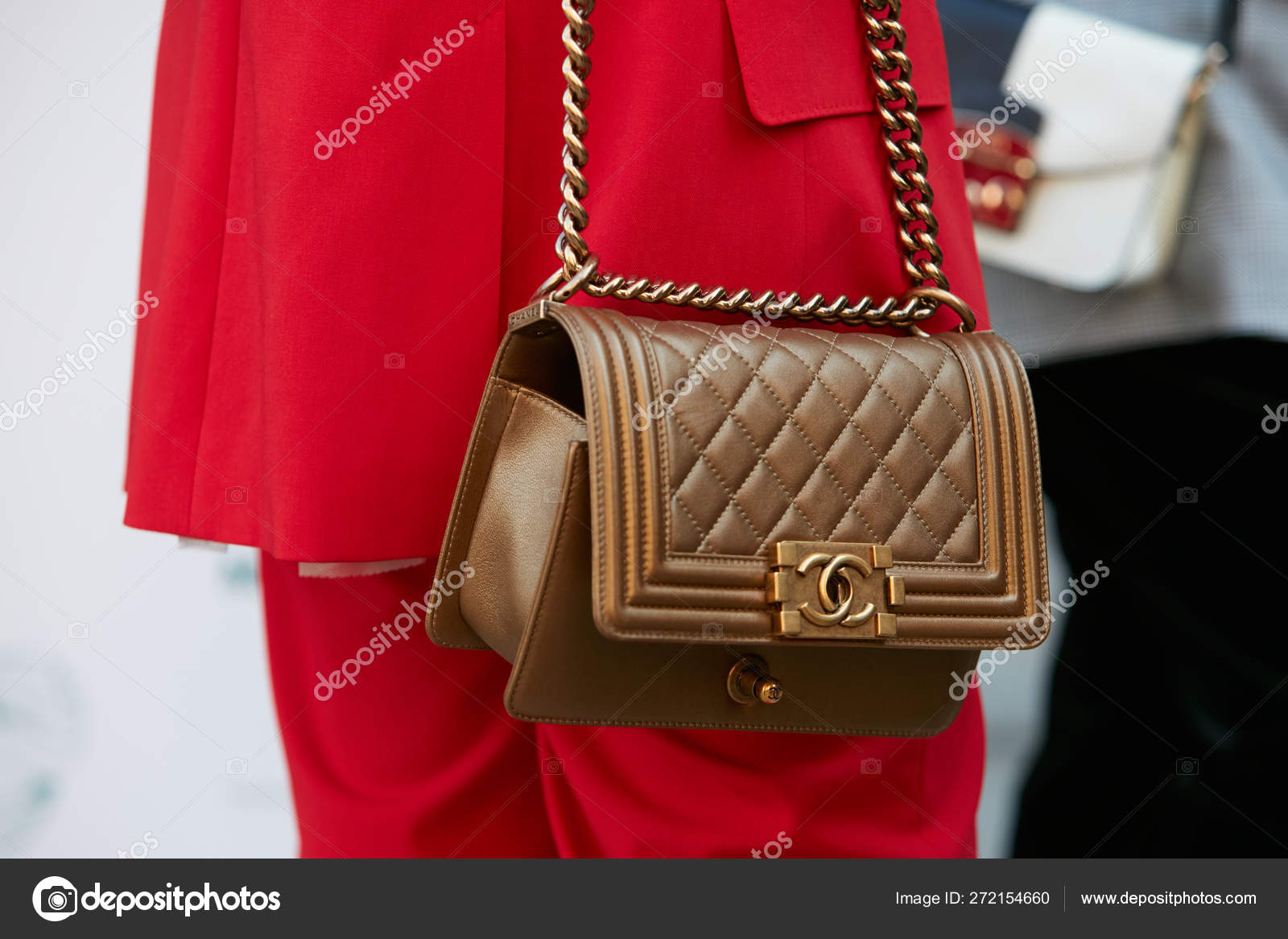 Woman with golden Chanel bag and red dress before Max Mara fashion show,  Milan Fashion Week street style on September 21, 2017 in Milan. – Stock  Editorial Photo © AndreaA. #272154660