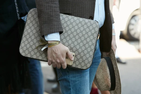 MILAN, ITALY - JANUARY 12, 2019: Man with brown Louis Vuitton backpack and  black padded jacket before Frankie Morello fashion show, Milan Fashion Week  Stock Photo - Alamy