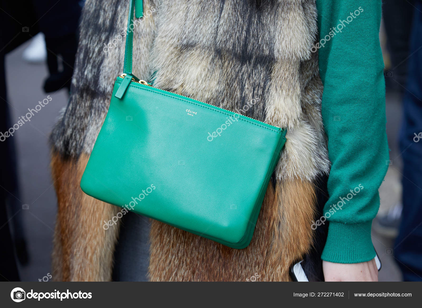 Woman with green leather Celine bag and beige and brown fur coat before  fashion Albino Teodoro show, Milan Fashion Week street style on February  21, 2018 in Milan. – Stock Editorial Photo © AndreaA. #272271402