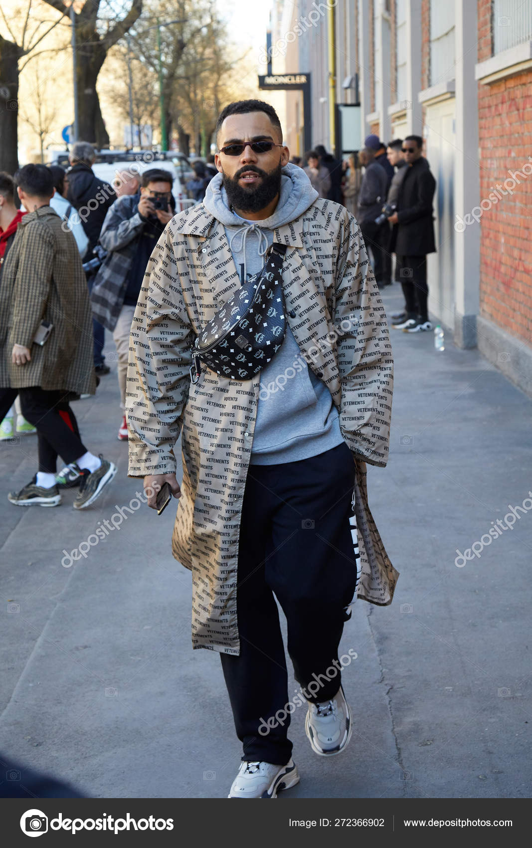 Man with Vetements beige trench coat 