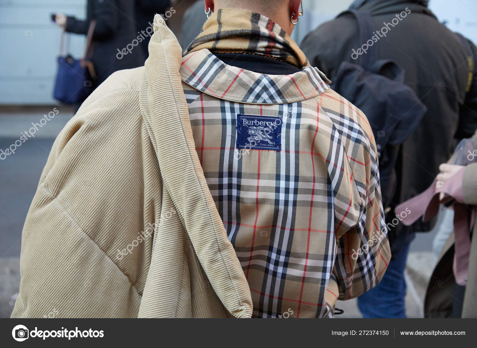 Man with beige Burberry checkered shirt 