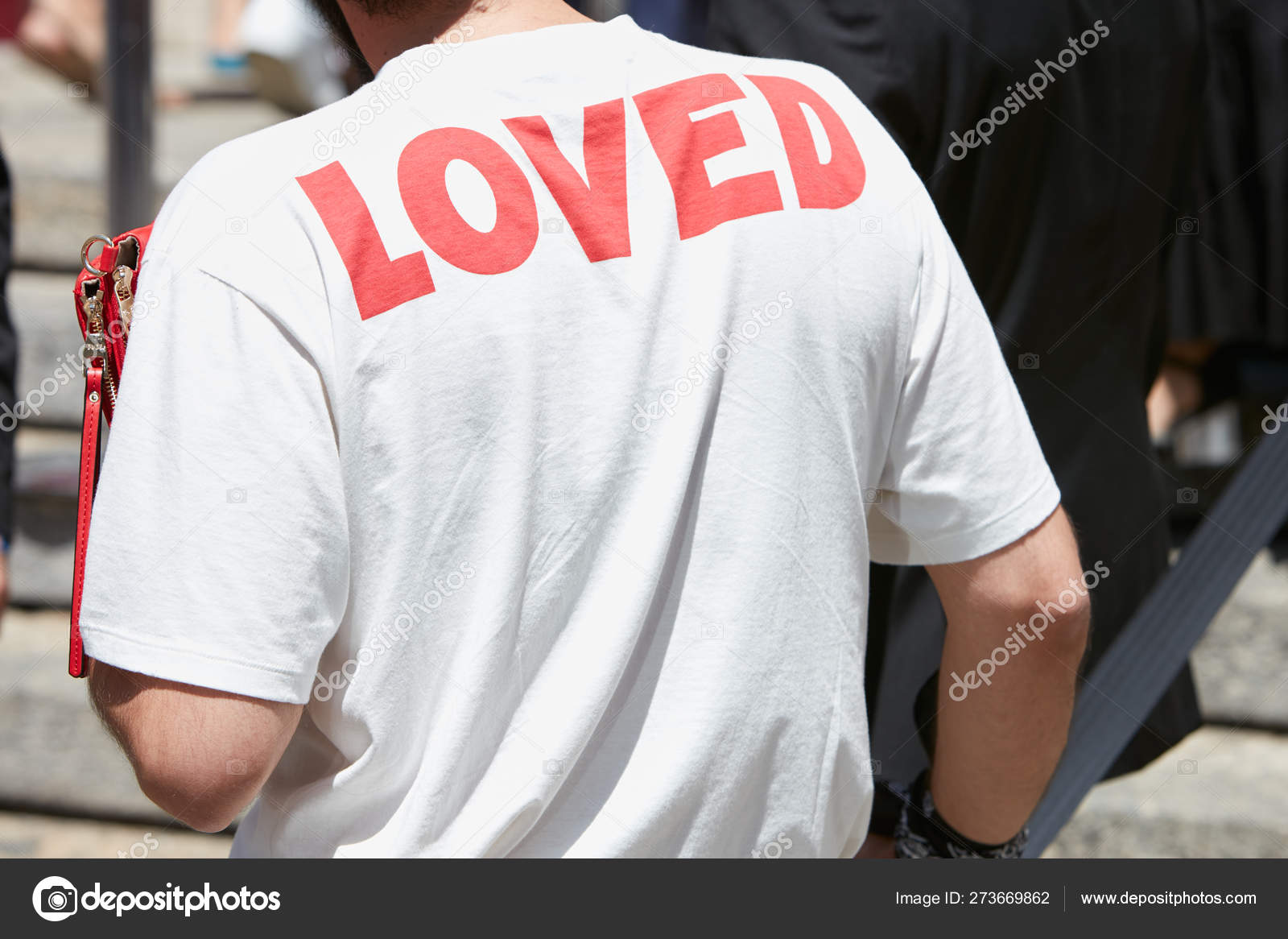 red shirt with white writing