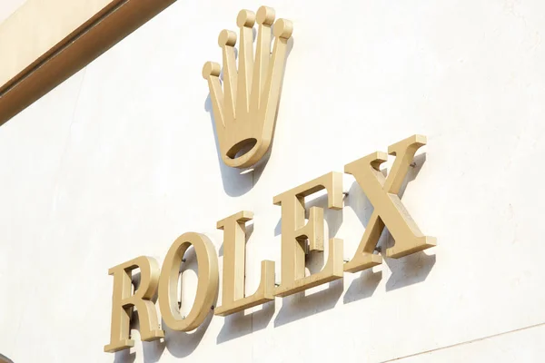 Rolex luxury watch store golden sign in Monte Carlo, Monaco. — Stock Photo, Image