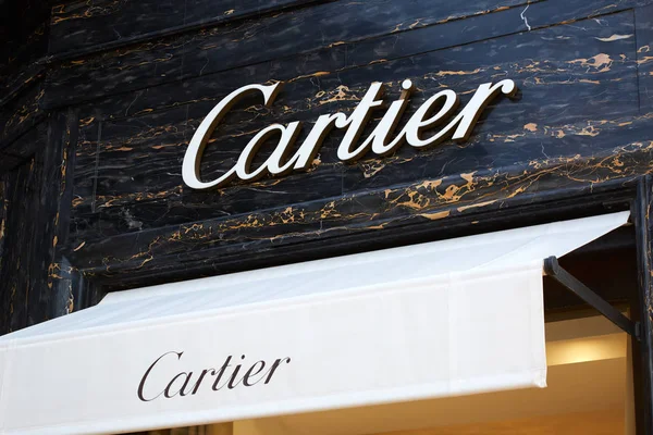 Cartier jewelry luxury store sign and black marble background in Monte Carlo, Monaco. — Stock Photo, Image