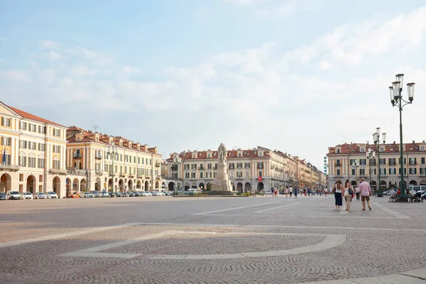 Galimberti square with people and tourists in a sunny summer day, blue sky in Cuneo, Italy — Stock Photo, Image