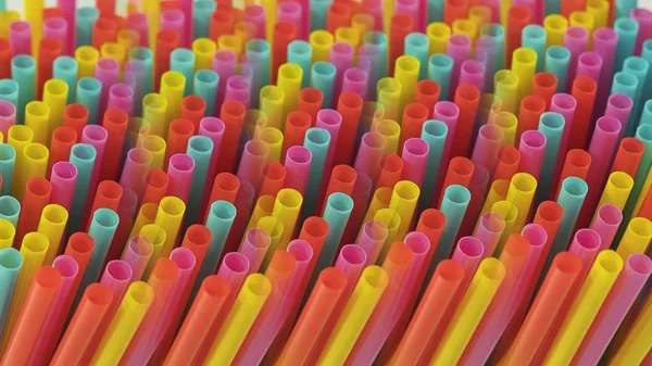 Abstract prismatic representation of one-use colorful plastic drinking straws, concept for excessive use of plastic, single use plastic ban, environmental  pollution or recycling issues