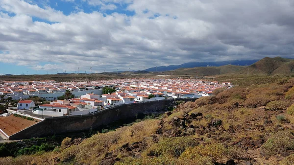 Views from the vantage point of the nearby hill towards the residential part of the remote village of Abades, previously known as Los Abriguitos, in the south-east of Tenerife, Canary Islands, Spain