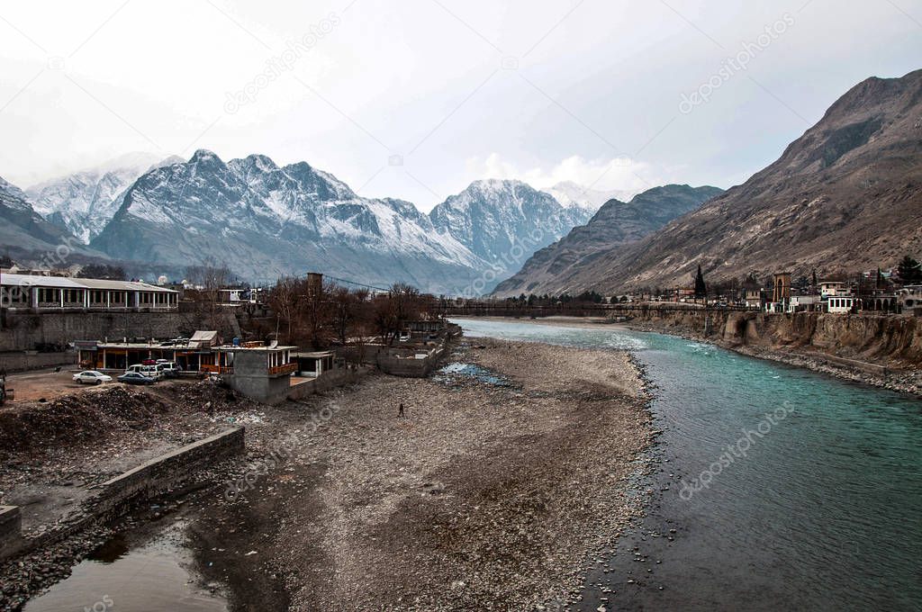 Gilgit city on along with Gilgit river during winter time 