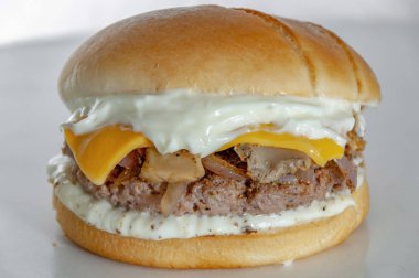 Beef burger with cheese and sauce
