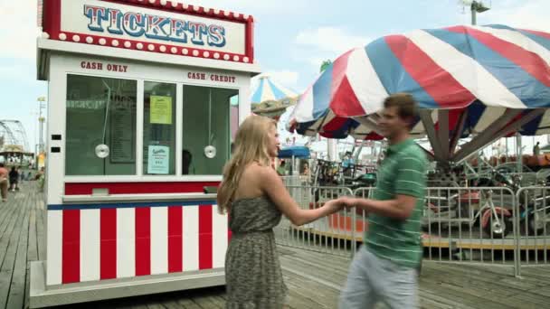 Teenage Couple Buying Ticket Amusement Park — Stock Video